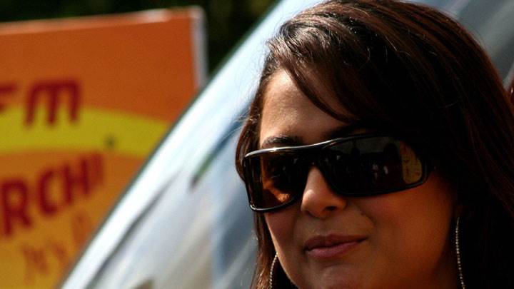 Amrita Arora Smiling In Black Goggles Face Closeup